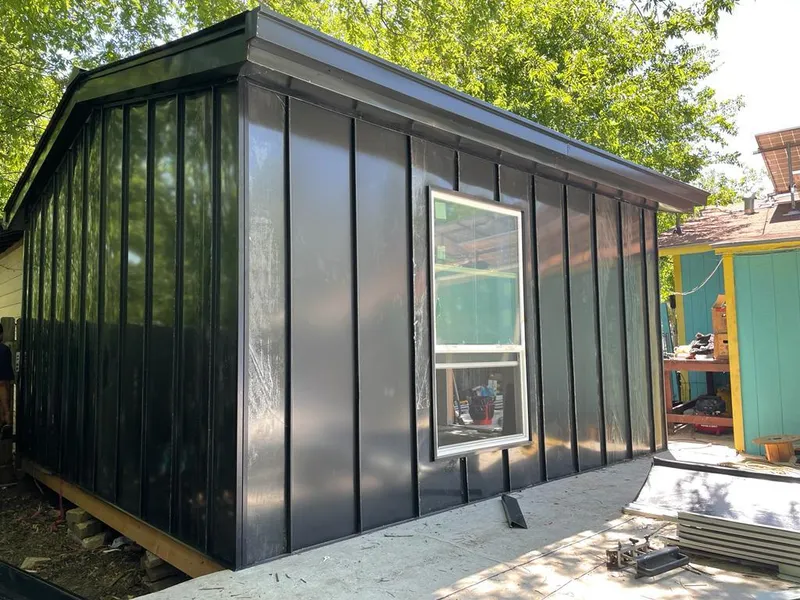 Black standing seam metal wall panels for Metal Roof Installation in Yukon