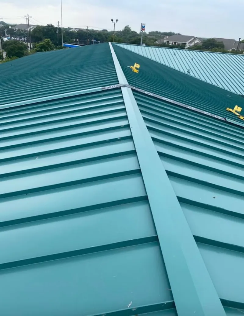 Green commercial metal roof ridge and valley for Metal Roof Repair in Yukon